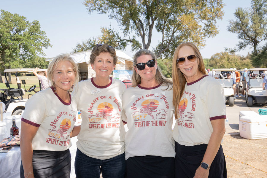 DSEF members smiling at Schoolhouse Scramble event